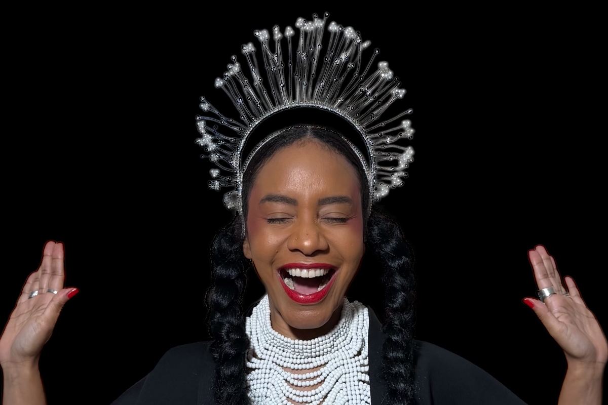 AnaQomSoul laughing with silver headpiece